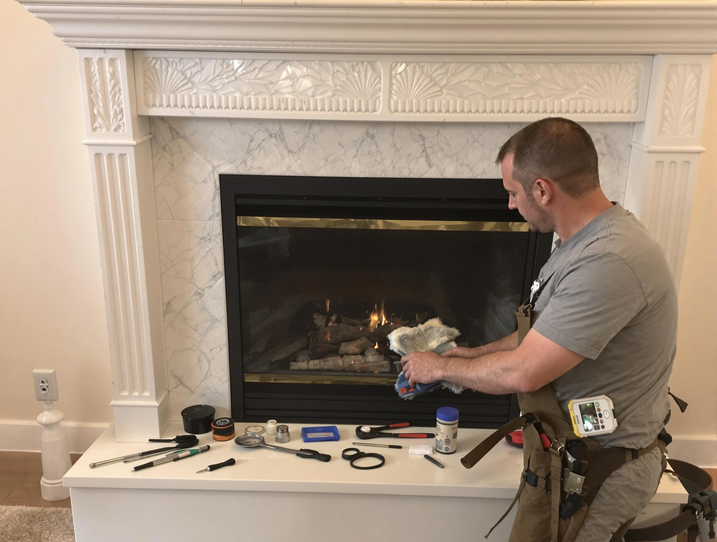 Kennesaw Chimney Sweep performing fireplace maintenance in Kennesaw, GA